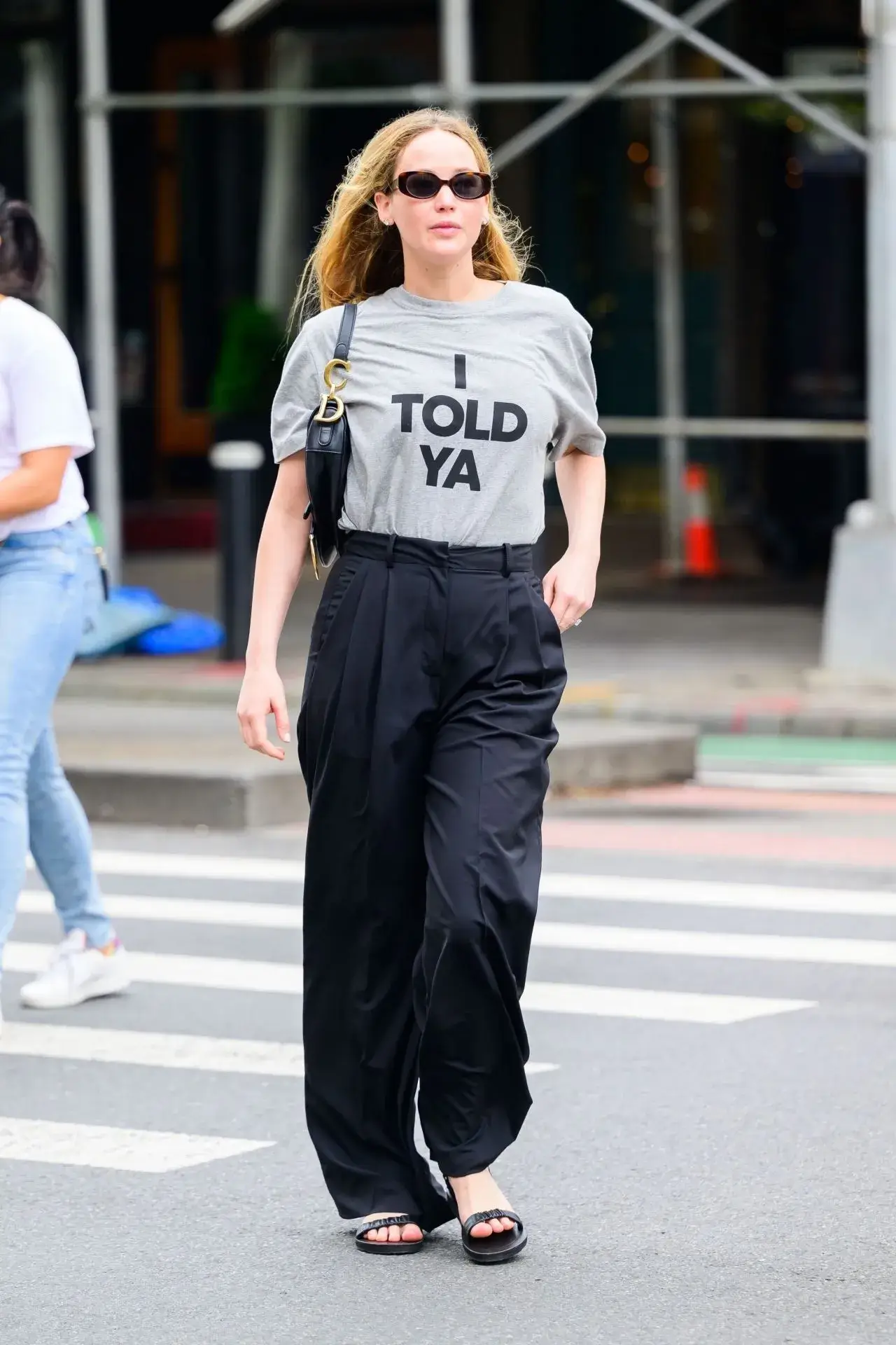 Jennifer Lawrence Stills in Loewe T shirt Black Pant New York City Street